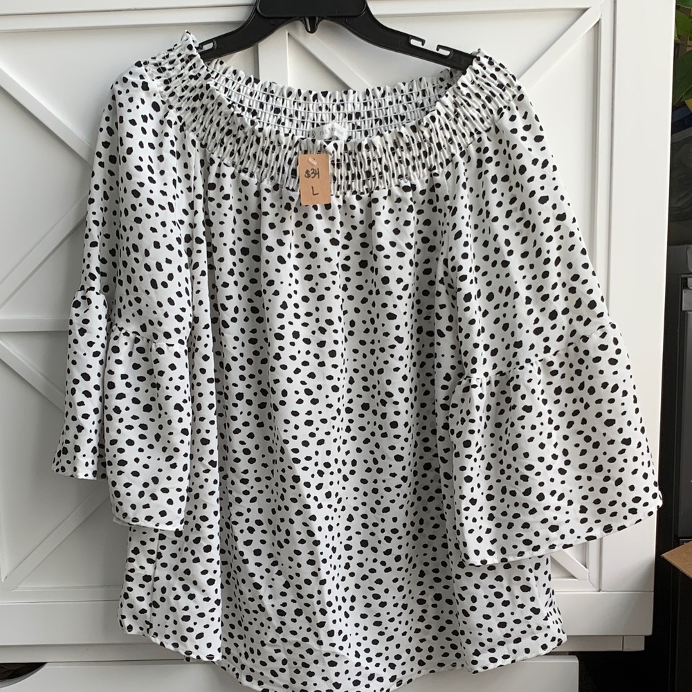 Elegant Black and White Spotted Off-Shoulder Blouse